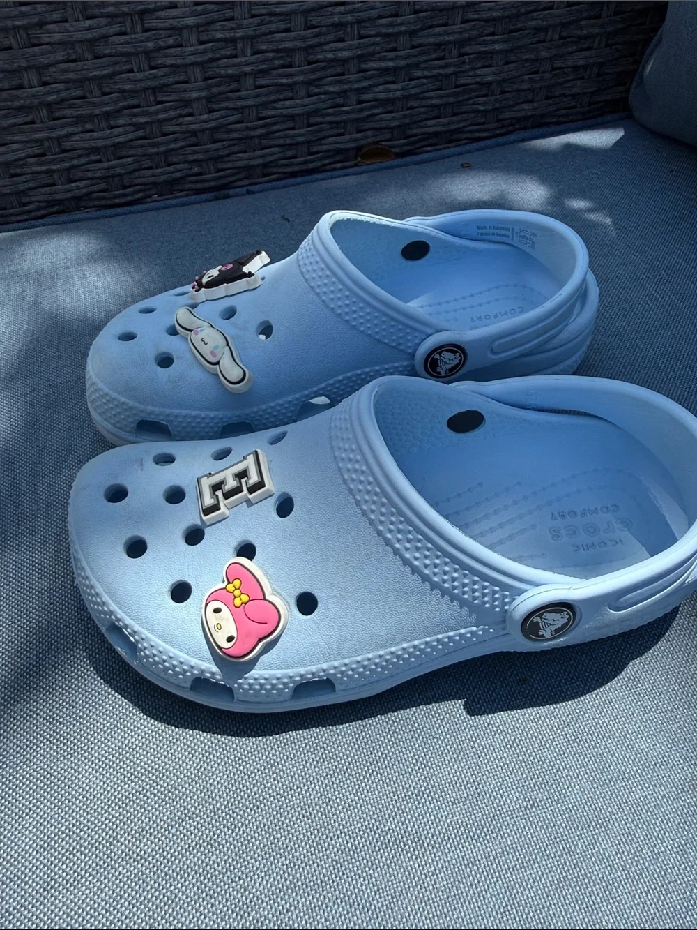 CROCS Kids Light Blue Clogs with Character Jibbitz